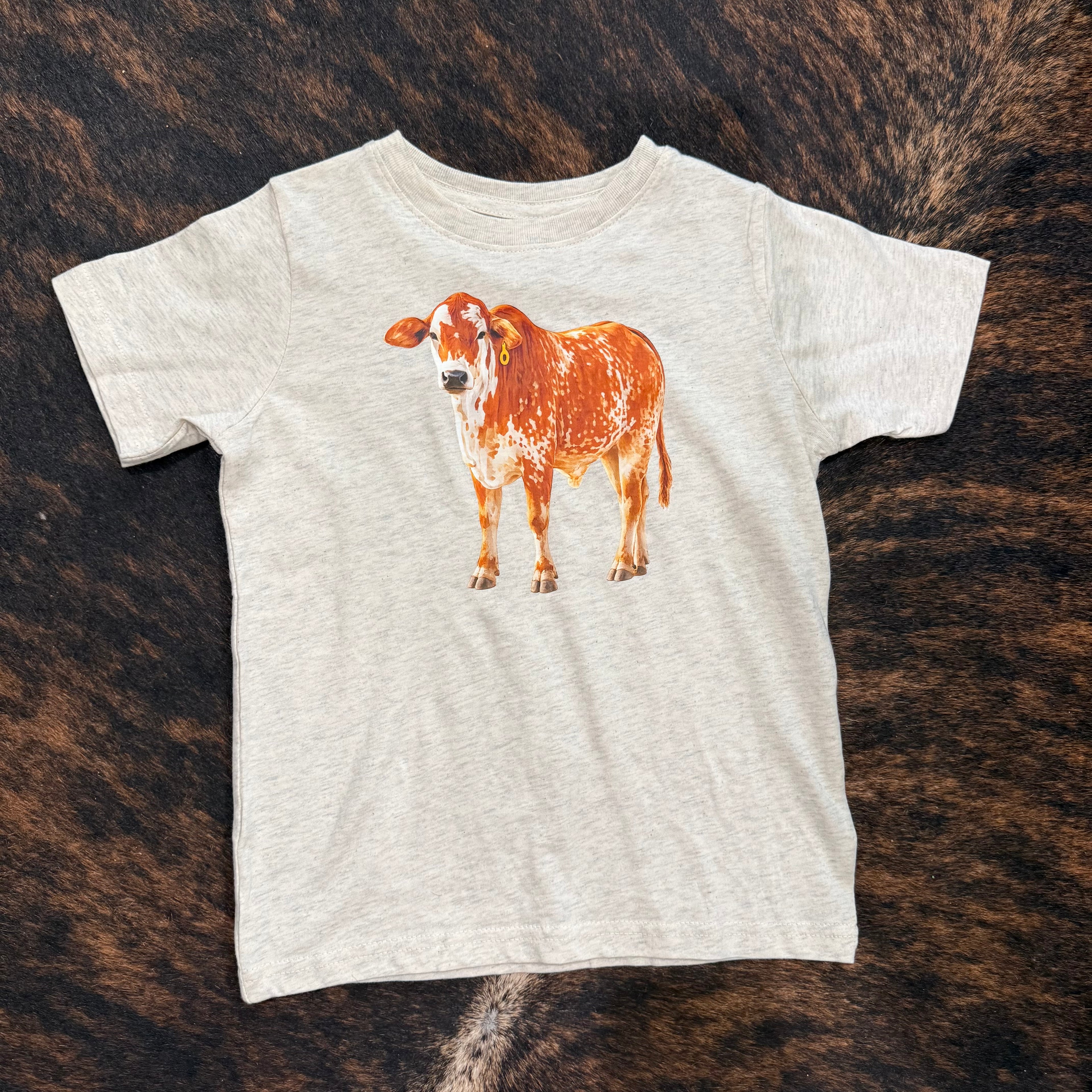 Rusty Toddler Tee on Natural Heather